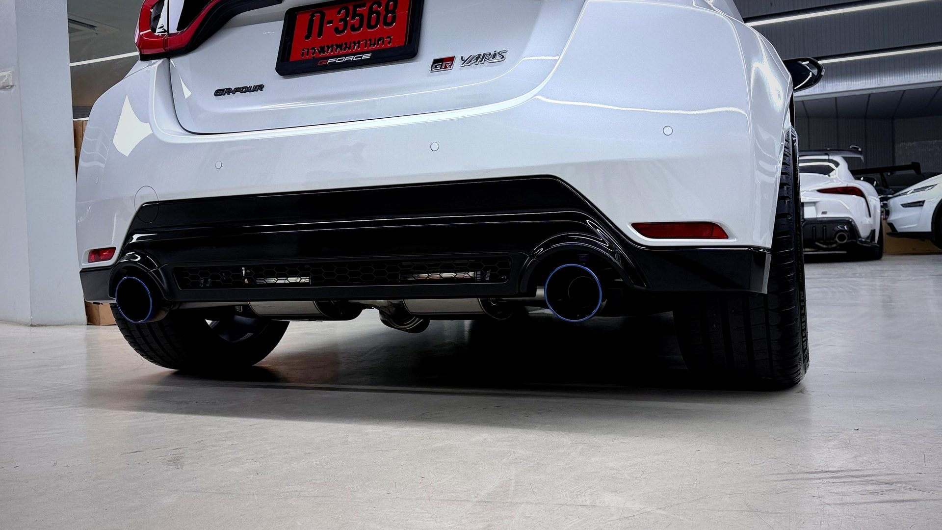 HKS exhaust titanium tip ติดตั้งบน GR Yaris — มุมมองด้านหลังต่ำ