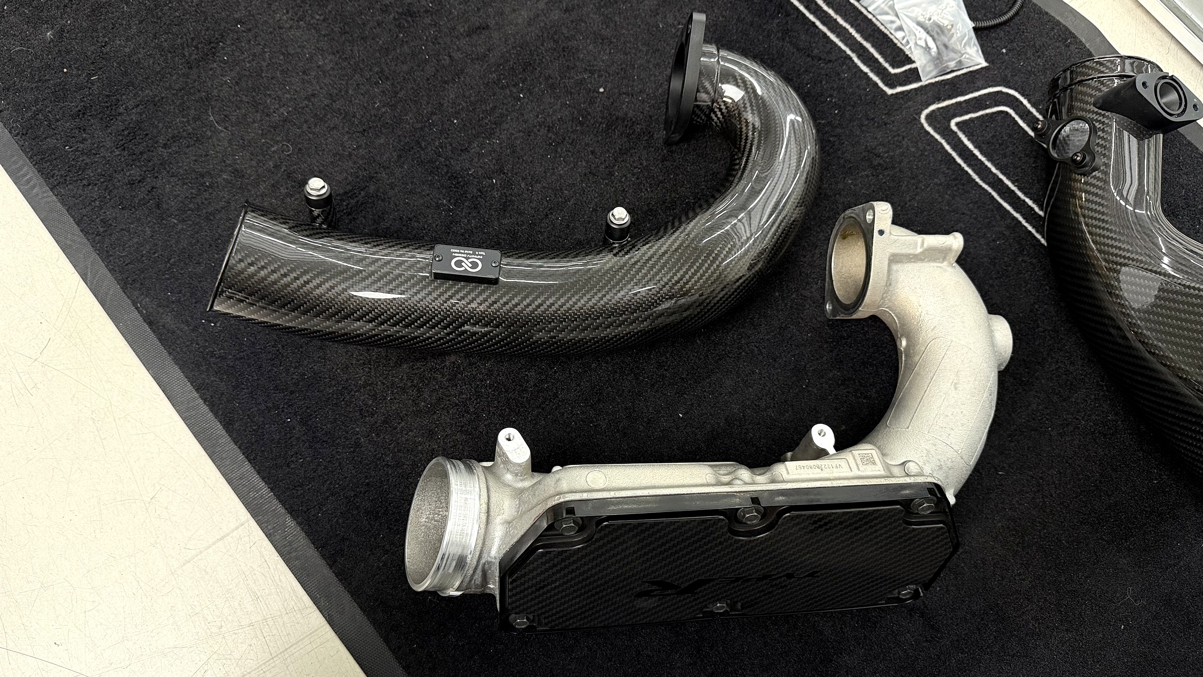 เปรียบเทียบ Turbo Inlet ของเดิมที่เป็นเหล็กกับ Infinity Design ที่เป็นคาร์บอน FL5